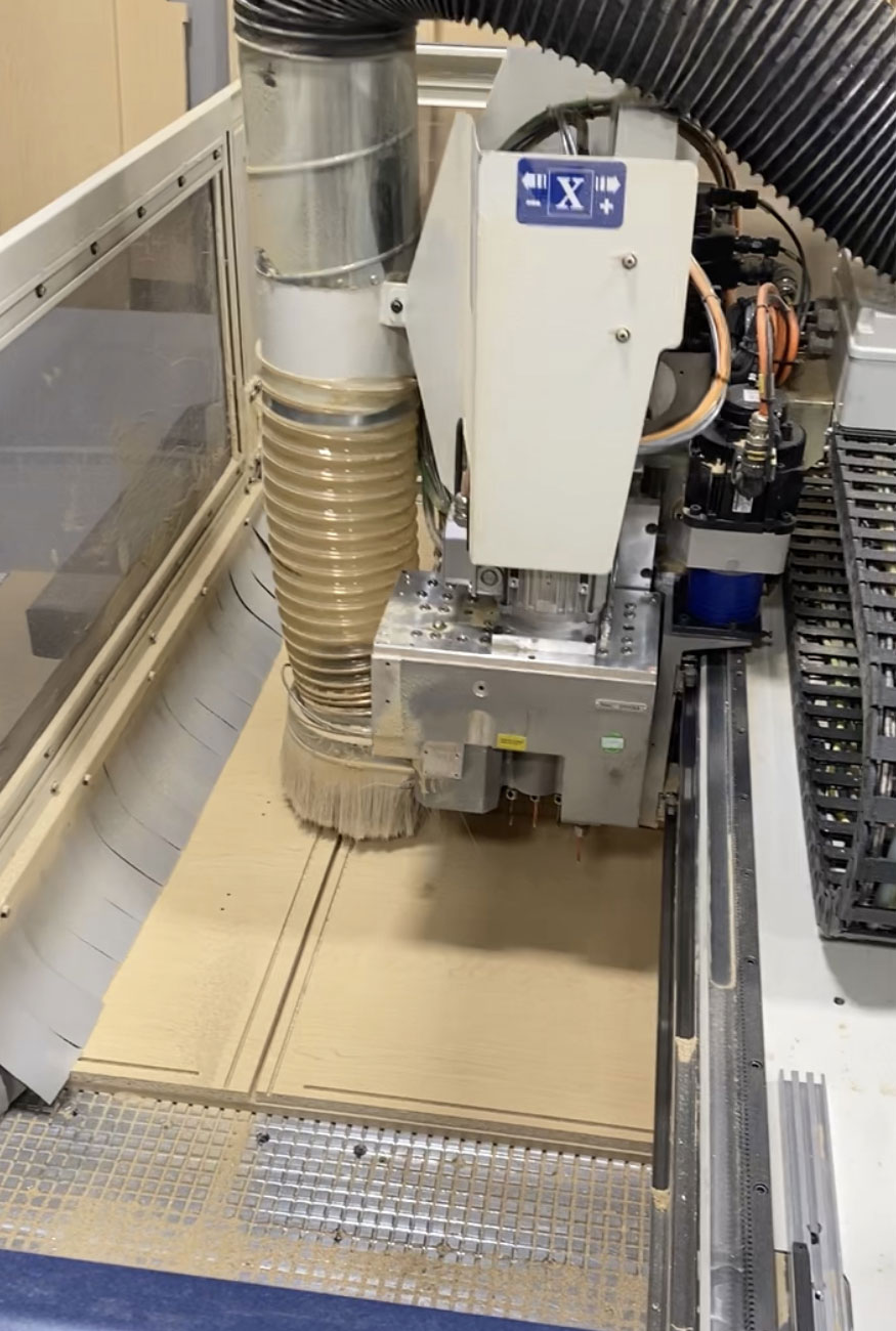 Machine Cutting Cupboard Door